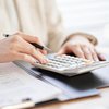 woman-calculating-commercial-real-estate-insurance