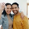 young-couple-holding-key-to-their-house